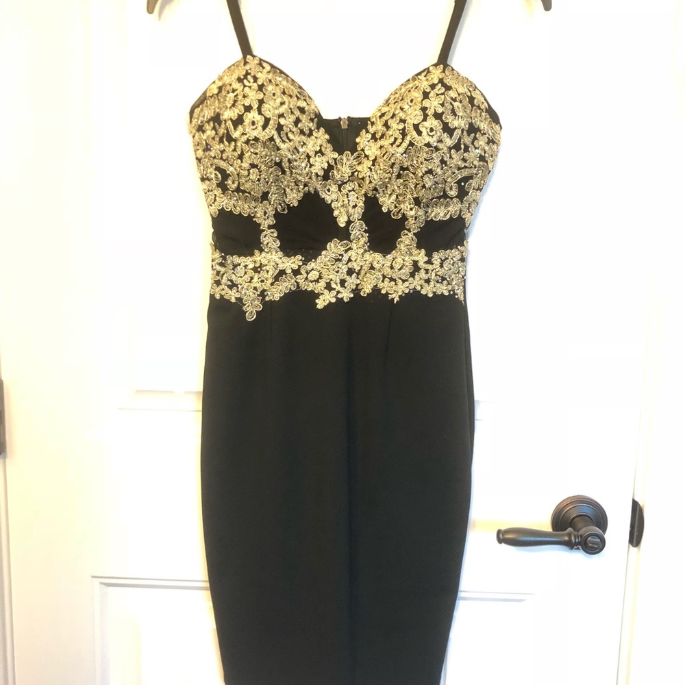 Black and gold embellished top